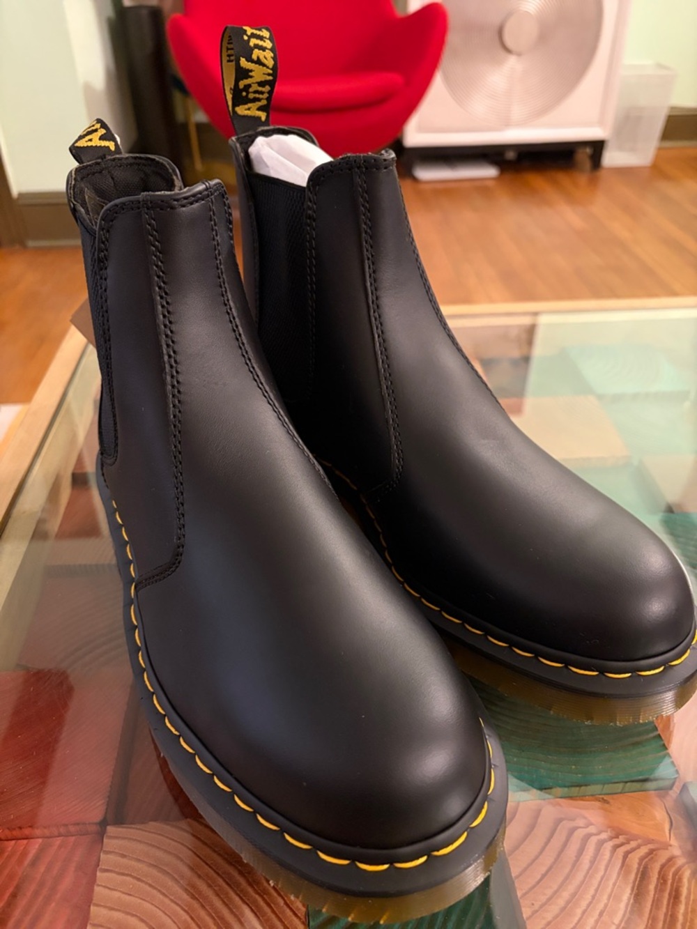Dr. Martens Black Leather Slip-On Boots with Yellow Stitching